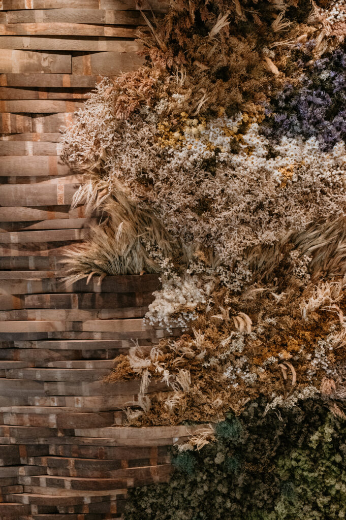 Close up detail of dried wild floral installation wall